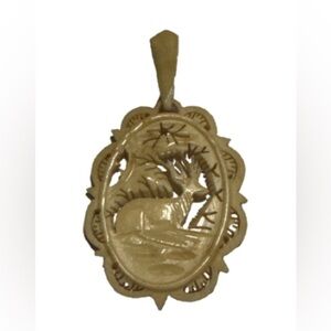 vintage art deco intricately, carved Deer  elk Pendant